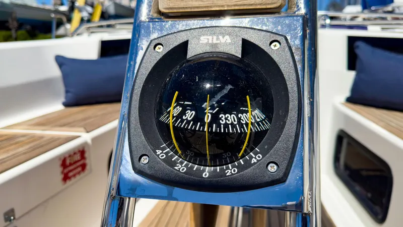 Slide: The Image of Close-up of a Silva compass on a 2014 Hanse 445 sailboat. - 9