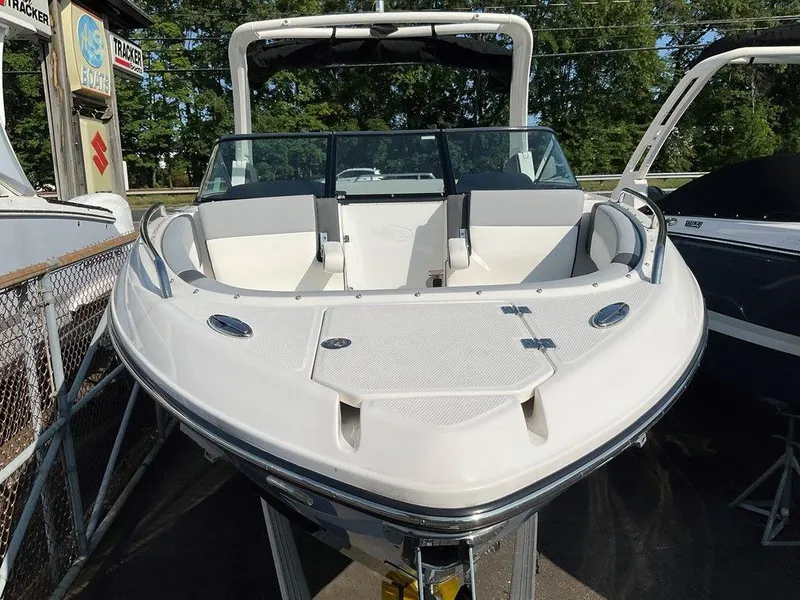 Slide: The Image of 2024 Chaparral 267 SSX boat with sleek design and spacious seating. - 15