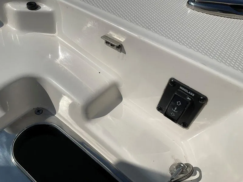 Slide: The Image of 2024 Chaparral 267 SSX boat deck with windlass control panel. - 20