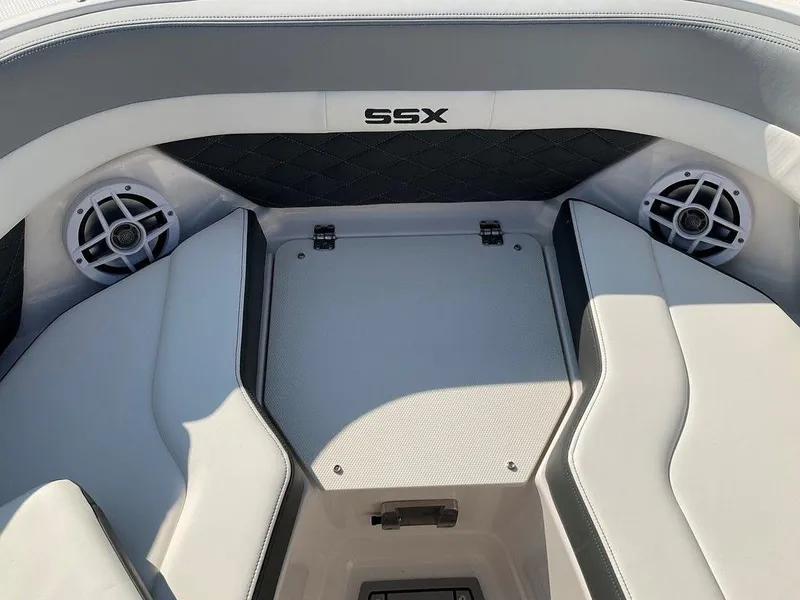 Slide: The Image of Interior of 2024 Chaparral 267 SSX boat with seating and speakers. - 30
