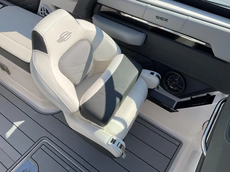 Slide: The Image of 2024 Chaparral 267 SSX boat interior with luxurious seating and modern design. - 31