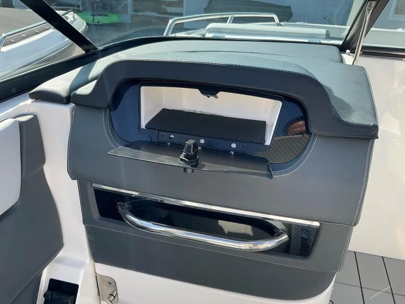 Slide: The Image of 2024 Chaparral 267 SSX dashboard with sleek design and modern controls. - 49