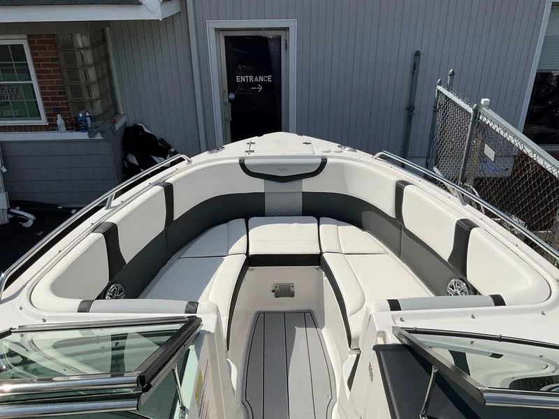 Slide: The Image of 2024 Chaparral 270 OSX boat interior with spacious seating and modern design. - 37