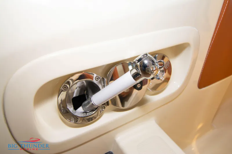 Slide: The Image of Fuel inlet of 2024 Capoforte SX280I boat with chrome finish. - 13