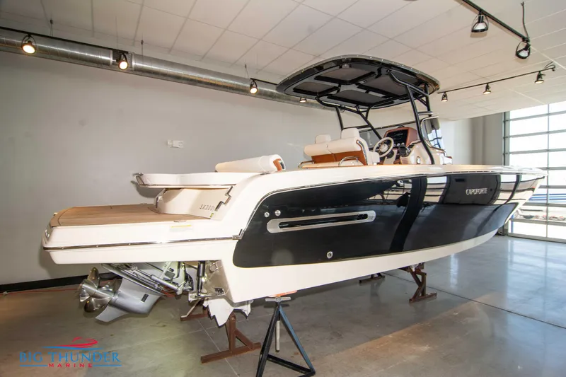 Slide: The Image of 2024 Capoforte SX280I luxury motorboat in showroom. - 3