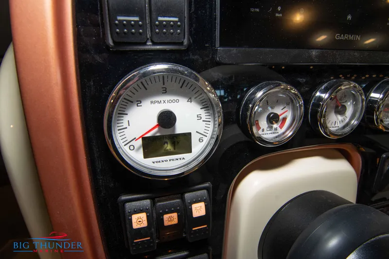 Slide: The Image of Close-up of 2024 Capoforte SX280I boat dashboard with gauges and controls. - 30