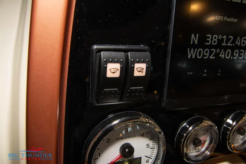 Slide: The Image of Close-up of Capoforte SX280I 2024 dashboard controls and gauges. - 32