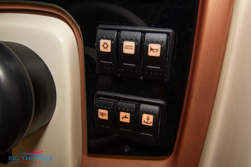 Slide: The Image of Control panel of 2024 Capoforte SX280I boat with various switches. - 34