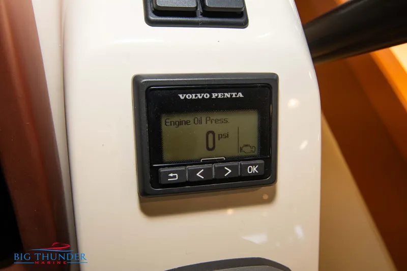 Slide: The Image of Volvo Penta engine oil pressure gauge on 2024 Capoforte SX280I boat dashboard. - 36
