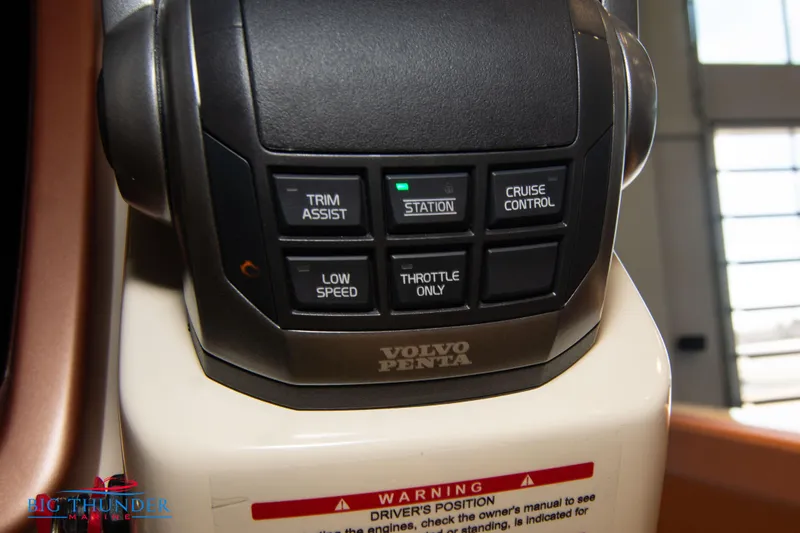 Slide: The Image of Close-up of 2024 Capoforte SX280I boat control panel with Volvo Penta buttons. - 39