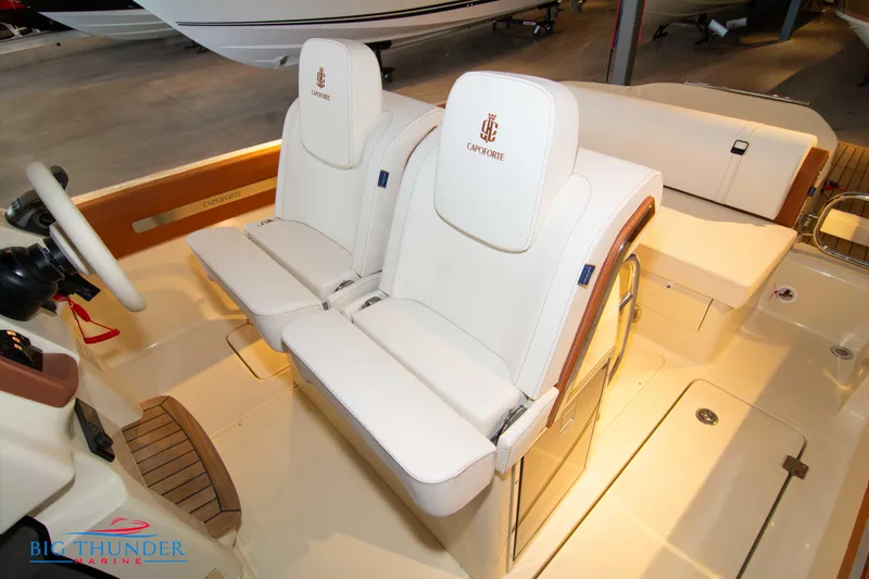 Slide: The Image of 2024 Capoforte SX280I boat interior with white leather seats. - 45