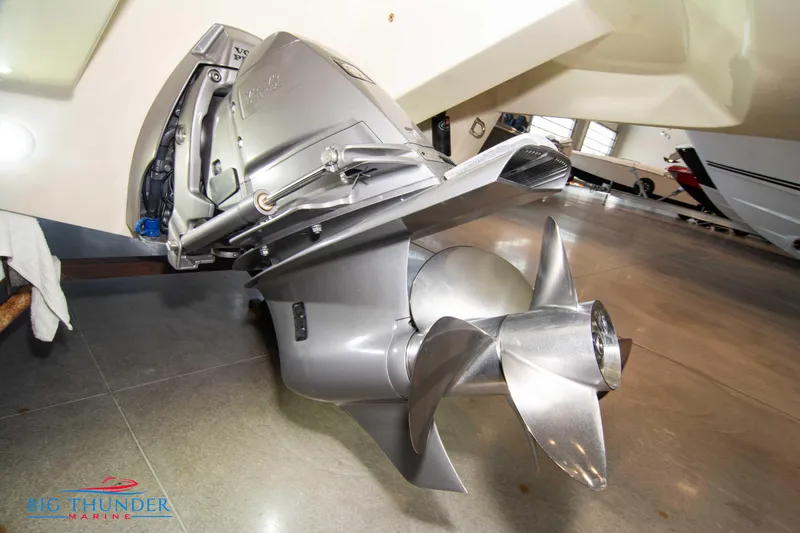 Slide: The Image of Close-up of 2024 Capoforte SX280I boat propeller in showroom. - 6