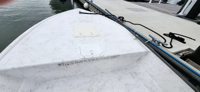 Slide: The Image of 2019 Wagner Catamaran Coaches boat docked at marina. - 11