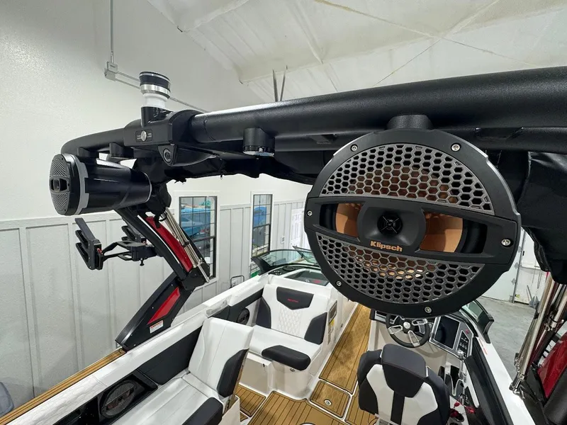 Slide: The Image of 2024 MasterCraft XT24 boat interior with Klipsch speakers and luxury seating. - 20