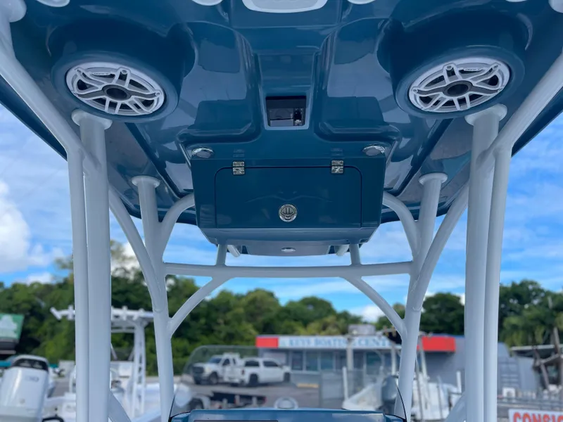 Slide: The Image of Turner Boatworks 2500 VS 2025 model, featuring overhead speakers and storage compartment. - 5