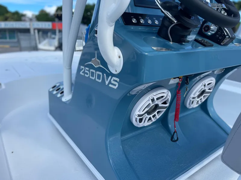 Slide: The Image of Turner Boatworks 2500 VS 2025 model boat console with speakers and steering wheel. - 6