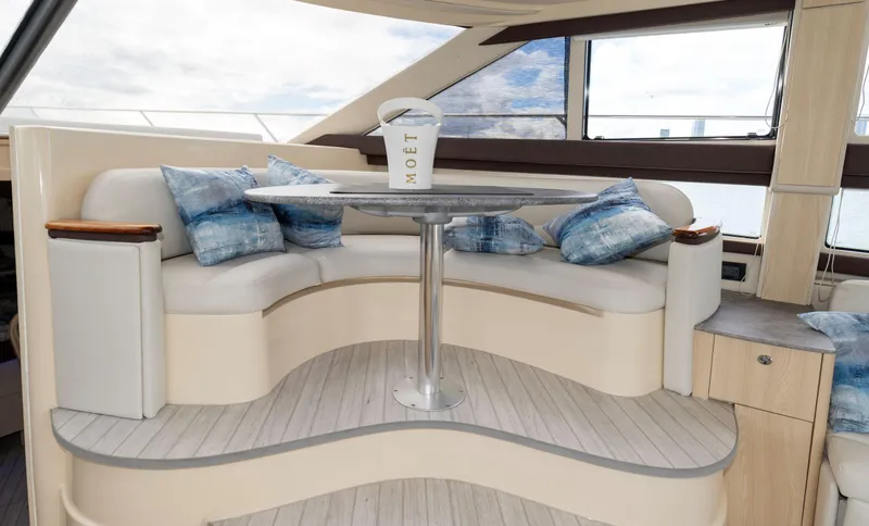 Slide: The Image of Luxurious interior of 2012 Meridian Sedan Bridge yacht with elegant seating and table. - 29