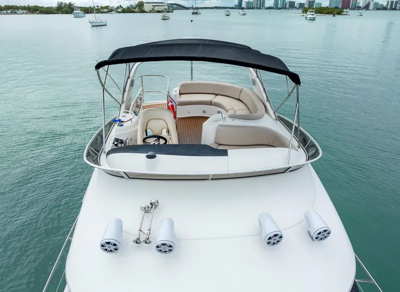 Slide: The Image of 2012 Meridian Sedan Bridge yacht with spacious upper deck and seating area. - 45