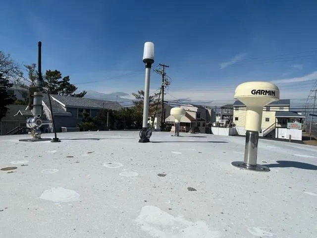 Slide: The Image of Top deck of a 1968 Wahoo Alglas 25 boat with Garmin equipment. - 21