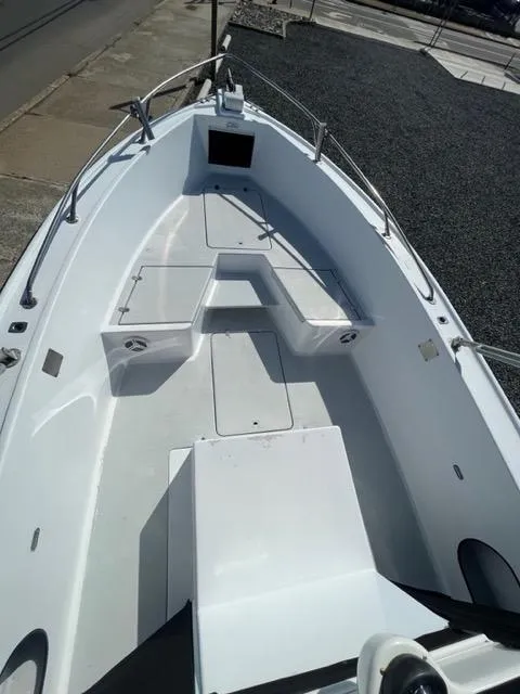 Slide: The Image of 1968 Wahoo Alglas 25 boat deck with seating and storage compartments. - 24