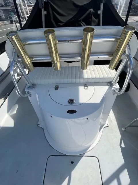 Slide: The Image of 1968 Wahoo Alglas 25 boat with rod holders and seating. - 28