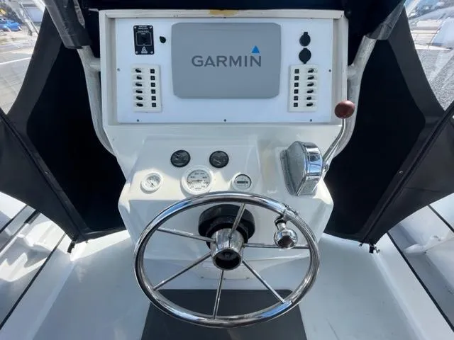 Slide: The Image of 1968 Wahoo Alglas 25 boat helm with Garmin navigation system. - 36