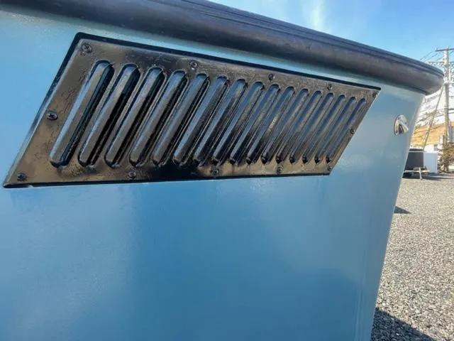 Slide: The Image of Close-up of a 1968 Wahoo Alglas 25 boat's side vent. - 45