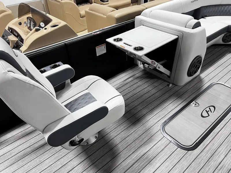 Slide: The Image of 2024 Harris Sunliner 250 Sport interior with luxurious seating and modern amenities. - 19
