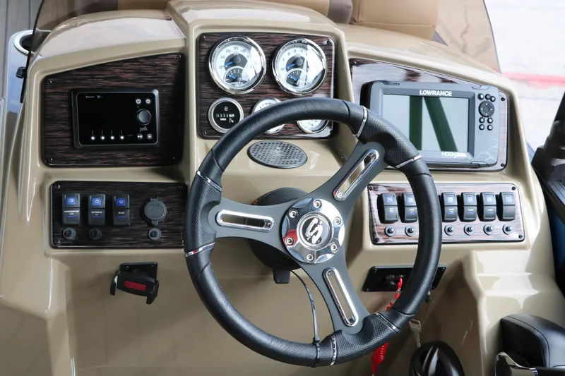 Slide: The Image of 2025 Sylvan Mirage X3 CLZ DH dashboard with steering wheel, gauges, and navigation system. - 34