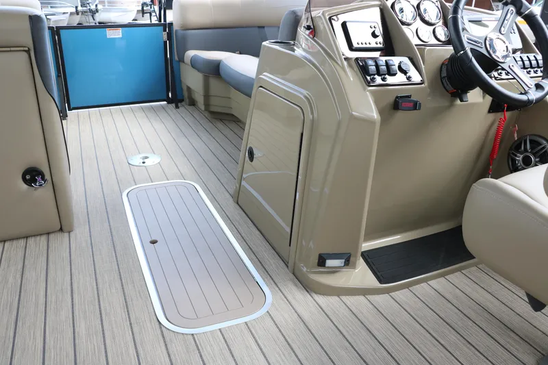 Slide: The Image of 2025 Sylvan Mirage X3 CLZ DH boat interior with modern dashboard and seating. - 39