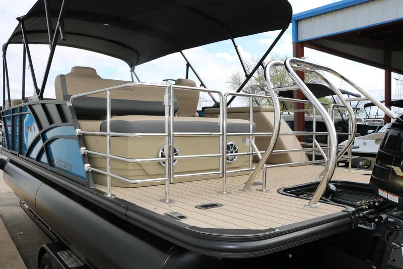 Slide: The Image of 2025 Sylvan Mirage X3 CLZ DH pontoon boat with sleek design and spacious deck. - 7