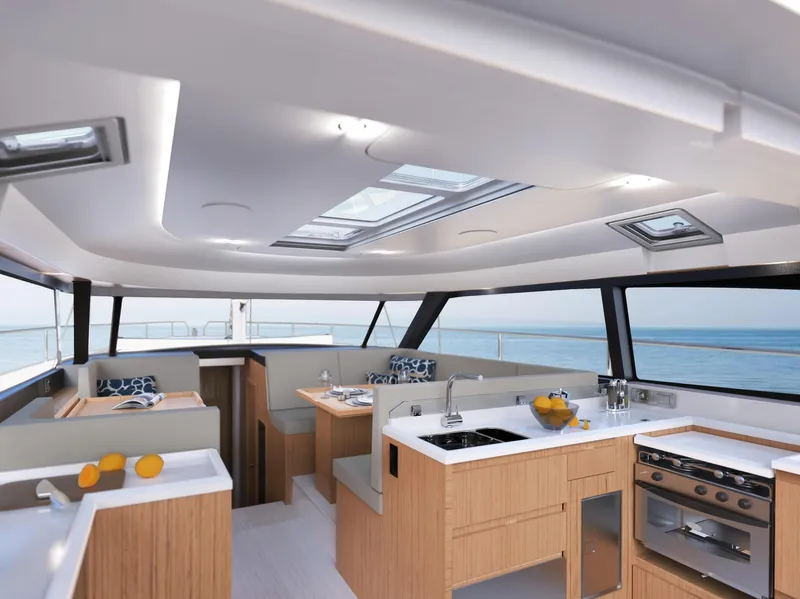 Slide: The Image of 2026 Moody 48 Deck Saloon yacht with people enjoying a sunny day at sea. - 7