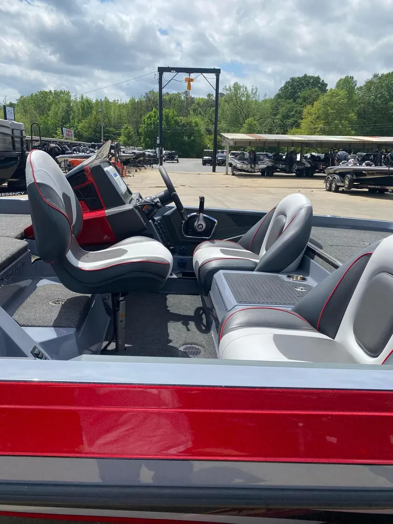 Slide: The Image of 2024 Ranger Z519 Ranger Cup Equipped boat interior with dual seats and steering console. - 5