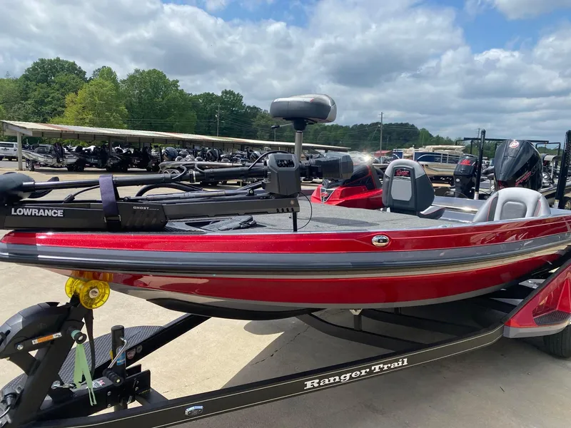 Slide: The Image of 2024 Ranger Z519 Ranger Cup Equipped boat in red on a trailer. - 7