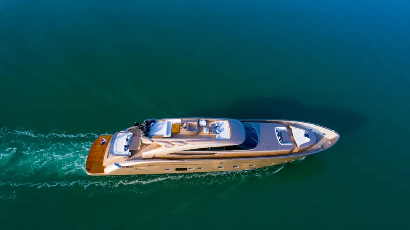 Slide: The Image of Aerial view of 2010 AB 118 luxury yacht cruising on calm waters. - 11