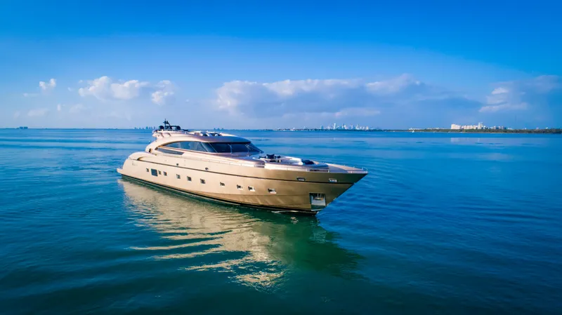 Slide: The Image of Luxurious 2010 AB 118 yacht cruising on calm blue waters under a clear sky. - 14