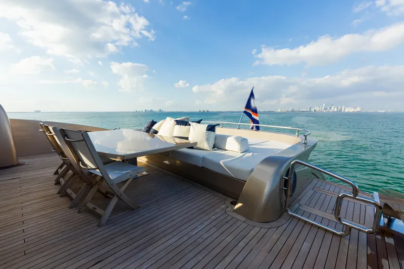 Slide: The Image of Luxury yacht deck with seating, table, and ocean view; AB 118 model, 2010. - 29