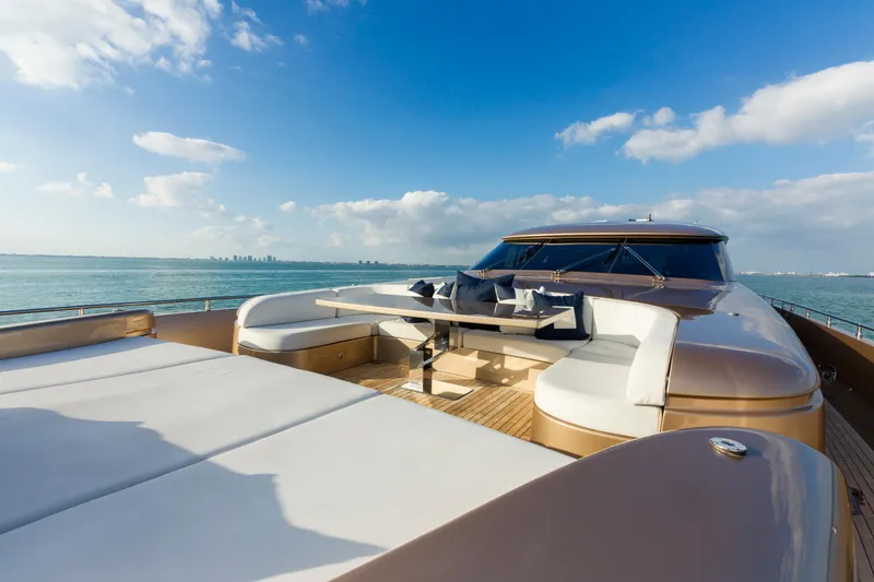 Slide: The Image of Luxurious AB 118 yacht deck with seating, ocean view, and clear blue sky, 2010 model. - 41