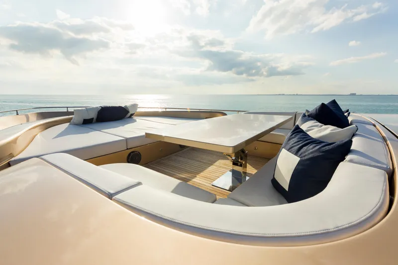 Slide: The Image of Luxurious AB 118 yacht deck with seating, cushions, and ocean view, 2010 model. - 42