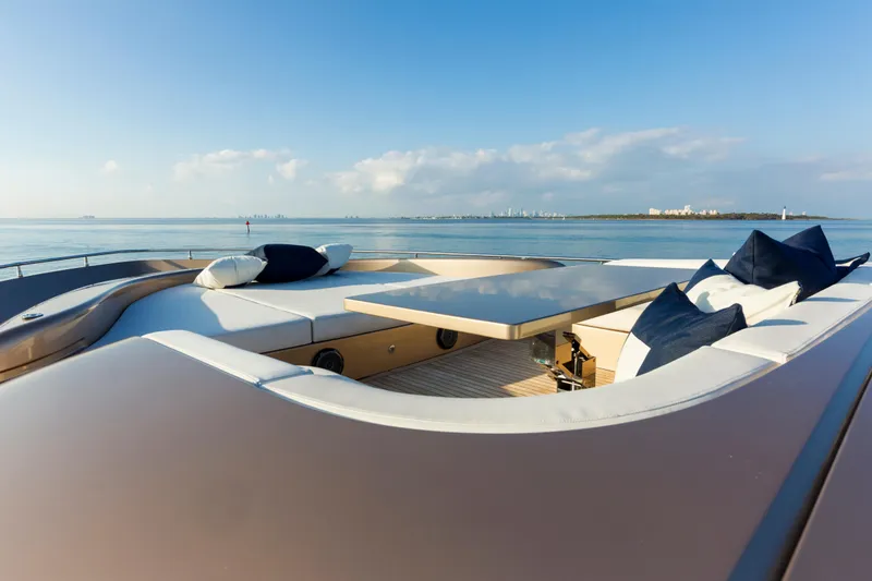 Slide: The Image of Luxurious AB 118 yacht deck with seating, table, and ocean view, 2010 model. - 49