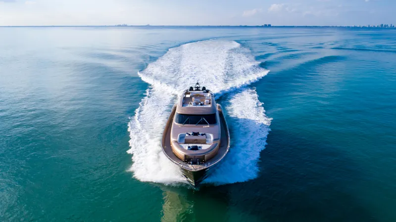 Slide: The Image of Luxurious AB 118 yacht cruising on open sea, 2010 model, leaving a wake behind. - 9