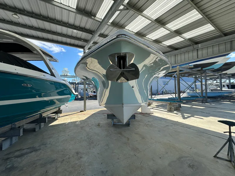 Slide: The Image of 2024 Sea Pro 322 Offshore boat in covered storage. - 4