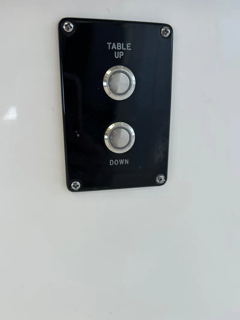 Slide: The Image of Control panel for adjustable table on 2024 Sea Pro 322 Offshore boat. - 8