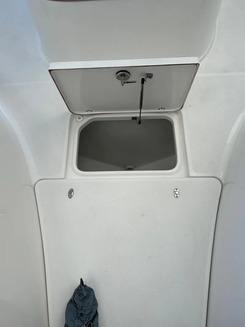 Slide: The Image of 2024 Sea Pro 322 Offshore boat storage compartment with open hatch. - 9
