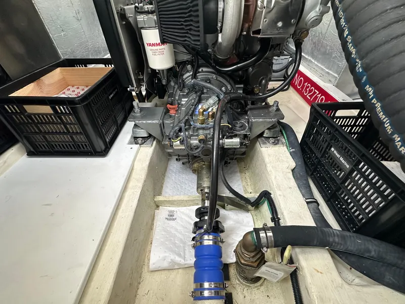 Slide: The Image of Engine compartment of a 2016 Marlow Pilot 31 boat with Yanmar components. - 27