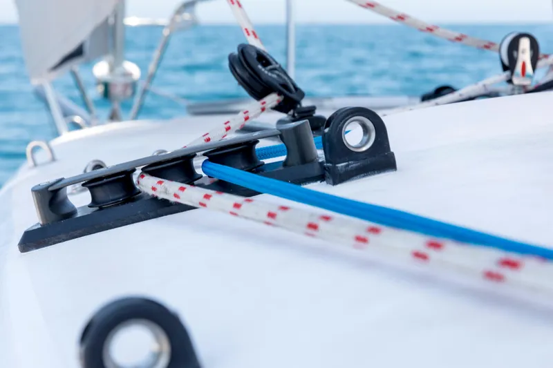 Slide: The Image of Close-up of sailing ropes and hardware on a 2026 Corsair 760 boat. - 20