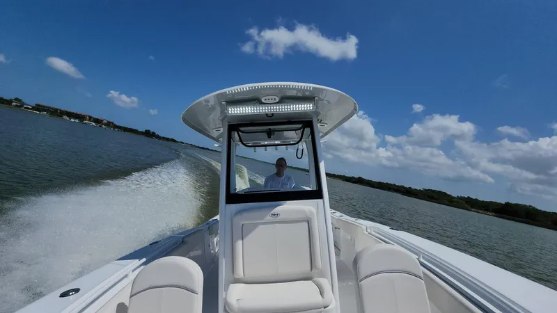 Slide: The Image of 2023 Sea Hunt Gamefish 27 cruising on a sunny day. - 11