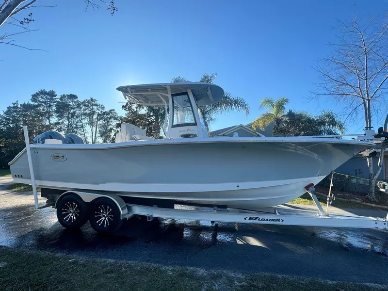 Slide: The Image of 2023 Sea Hunt Gamefish 27 on trailer, side view. - 18