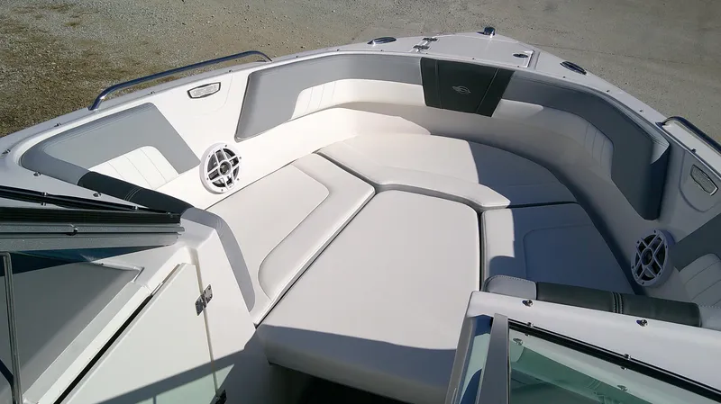 Slide: The Image of 2024 Chaparral 23 SSI SPORT boat interior with spacious seating and modern design. - 10