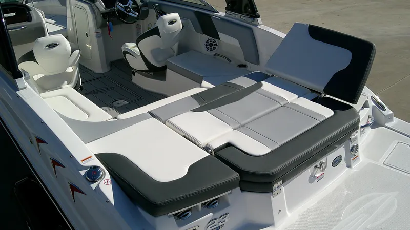 Slide: The Image of 2024 Chaparral 23 SSI SPORT boat interior with sleek seating and modern design. - 5